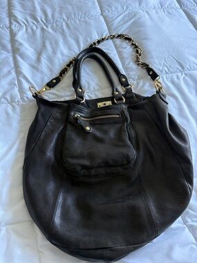 Spacious Black Leather Shoulder Bag with Gold Hardware